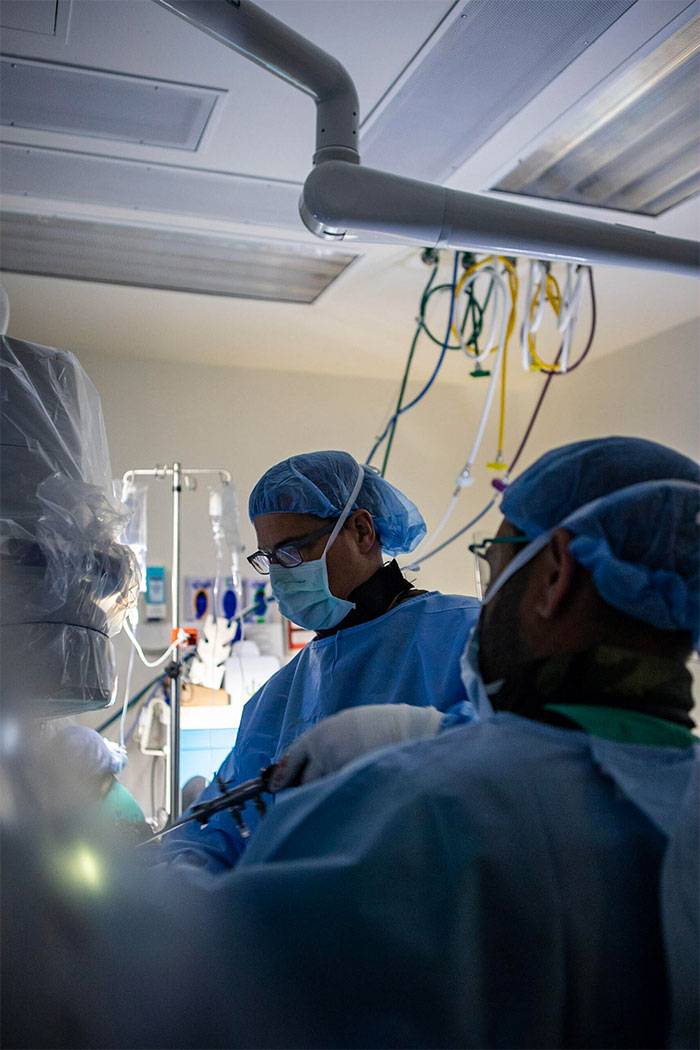 Dr. Hommen holding the arthroscope during hip arthroscopy.