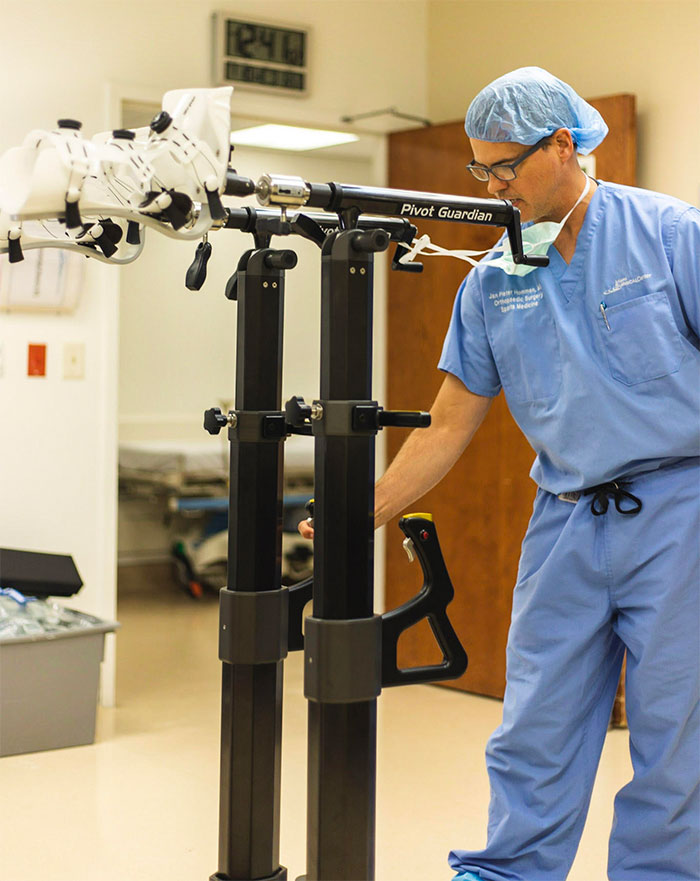 Dr. Hommen setting up the Stryker Guardian Hip Arthroscopy table.