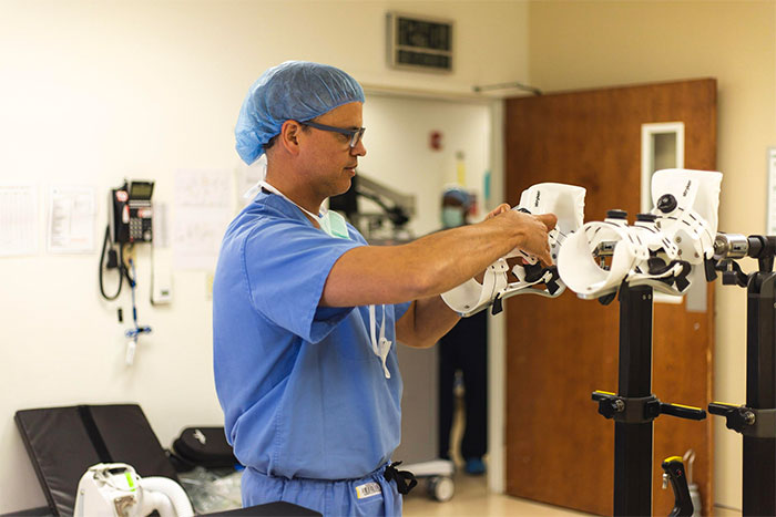 Dr. Hommen setting up the Stryker Guardian Hip Arthroscopy table.